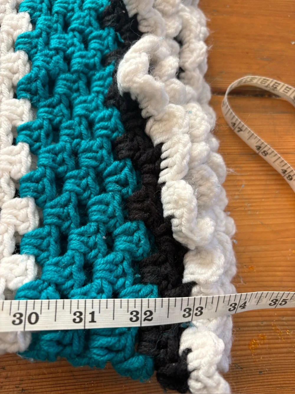 Handmade Teal Crochet Granny Square Blanket with White and Black Accent